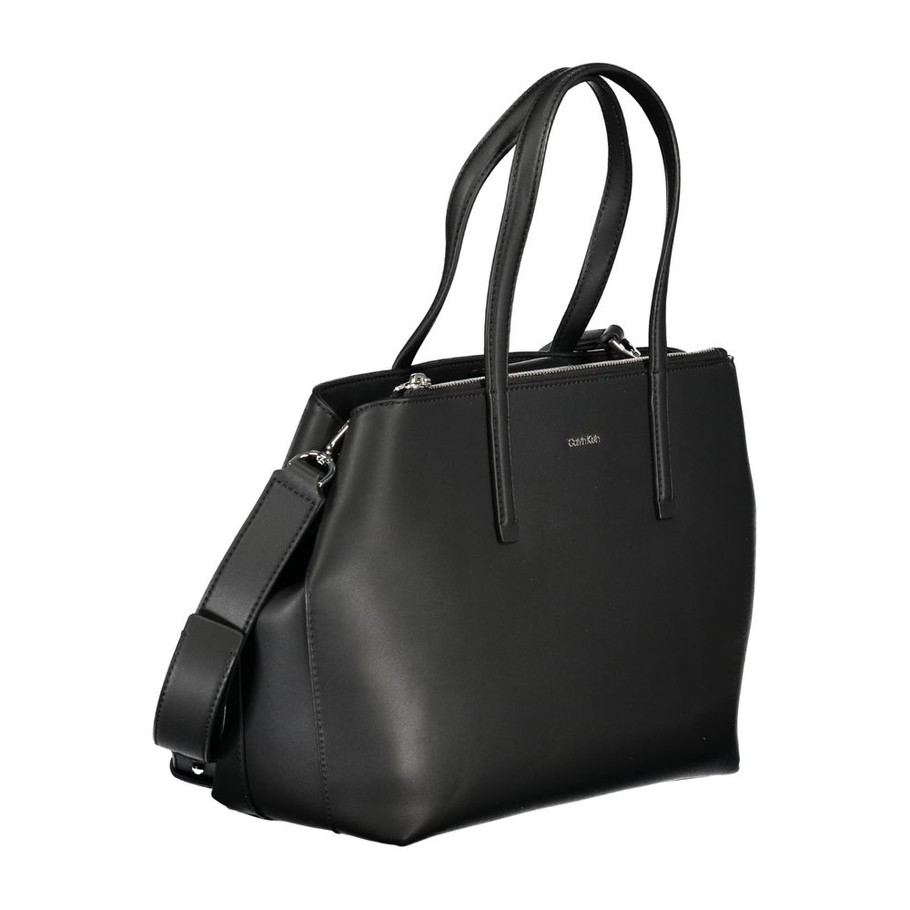 Calvin Klein Black Polyester Handbag with adjustable shoulder strap, two handles, external pocket, and logo detailing.