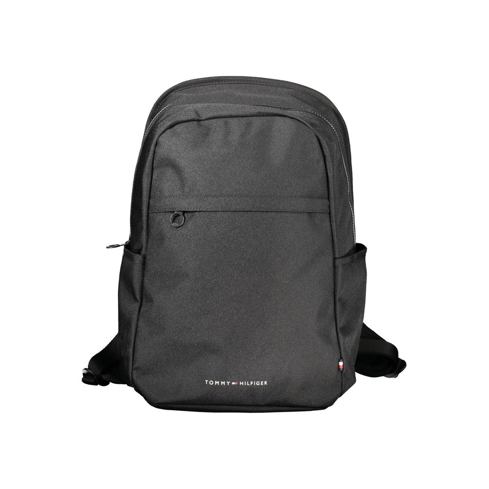 Tommy Hilfiger Black Polyester Backpack with adjustable straps, laptop compartment, multiple pockets, and zip closure, made from recycled material.