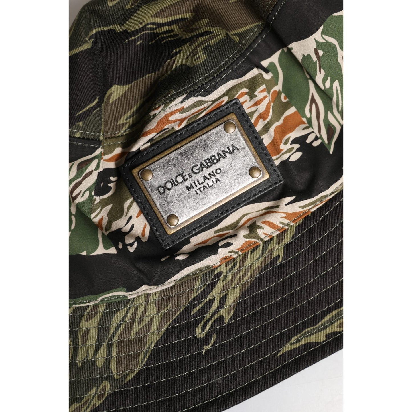 Dolce & Gabbana camo print wide brim bucket hat with DG plaque, made in Italy, crafted from cotton and elastane, luxury men's fashion.