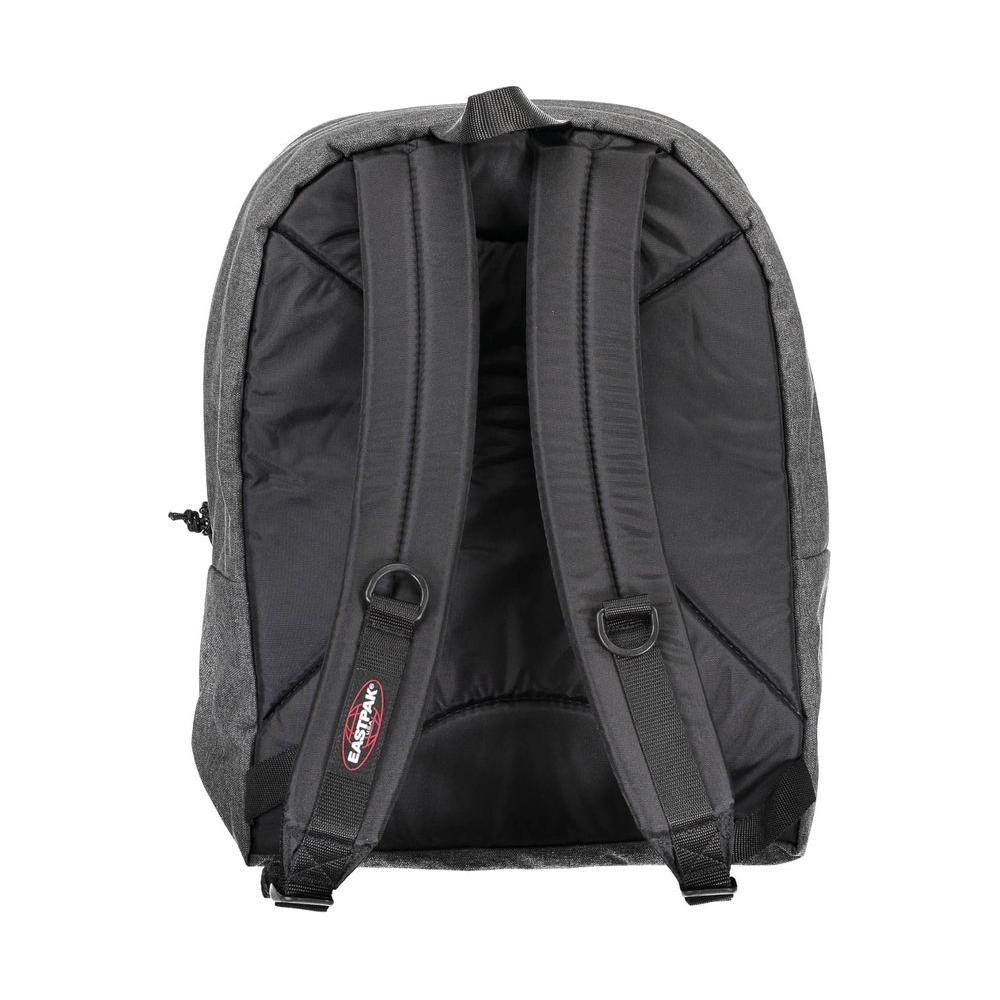 Eastpak gray polyamide backpack with adjustable straps, padded back, and logo detail, showcasing rear view and durable design.