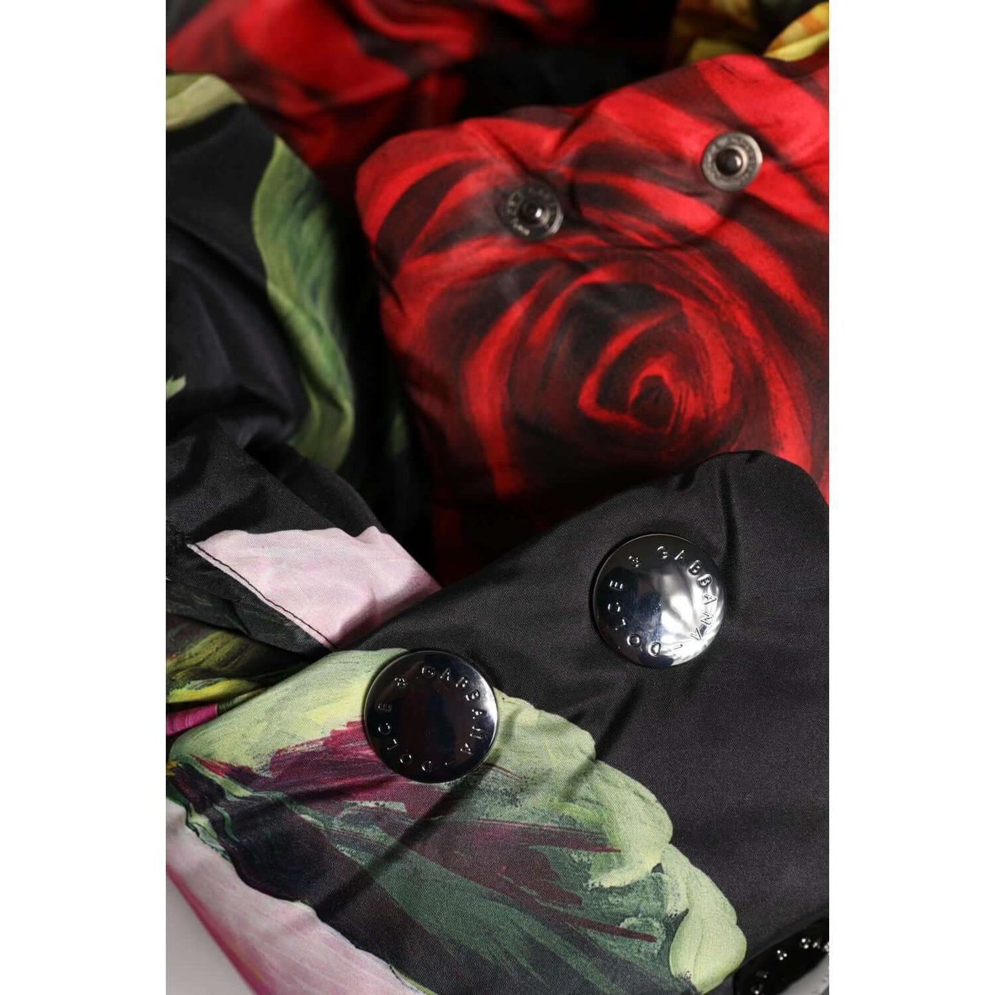 Dolce & Gabbana black floral head wrap hat, 100% polyester, detailed with logo buttons, featuring red rose print, made in Italy.