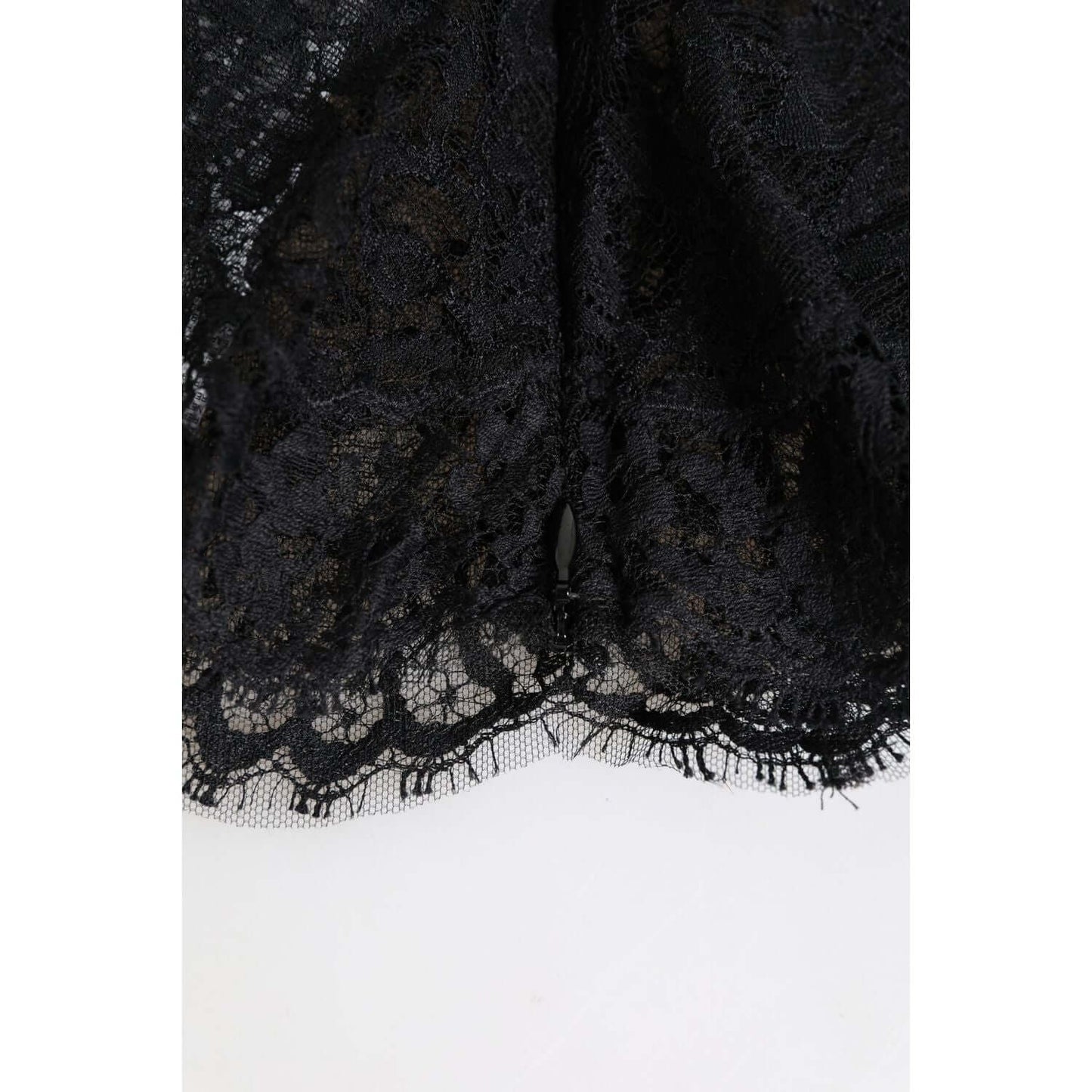Close-up of Dolce & Gabbana black floral lace whole head wrap hat made of nylon and silk, featuring intricate lace details.