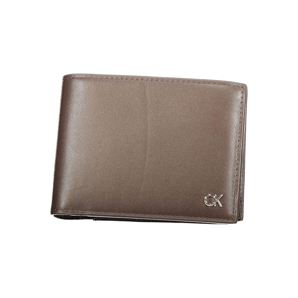 Calvin Klein brown leather wallet with RFID block, featuring 2 compartments, coin purse, card slots, and CK logo.