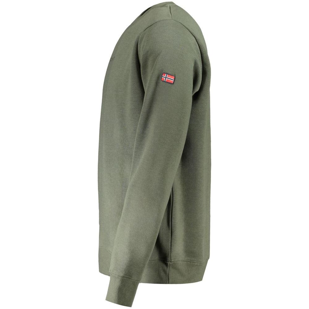 Side view of Norway 1963 green cotton men’s sweater with long sleeves and Norway flag patch on the shoulder.