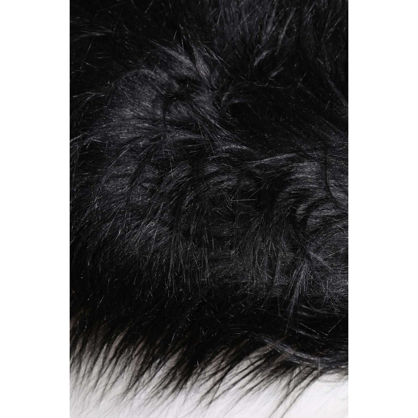 Close-up of Dolce & Gabbana black fur texture on bucket hat, showcasing the luxurious acrylic blend material.