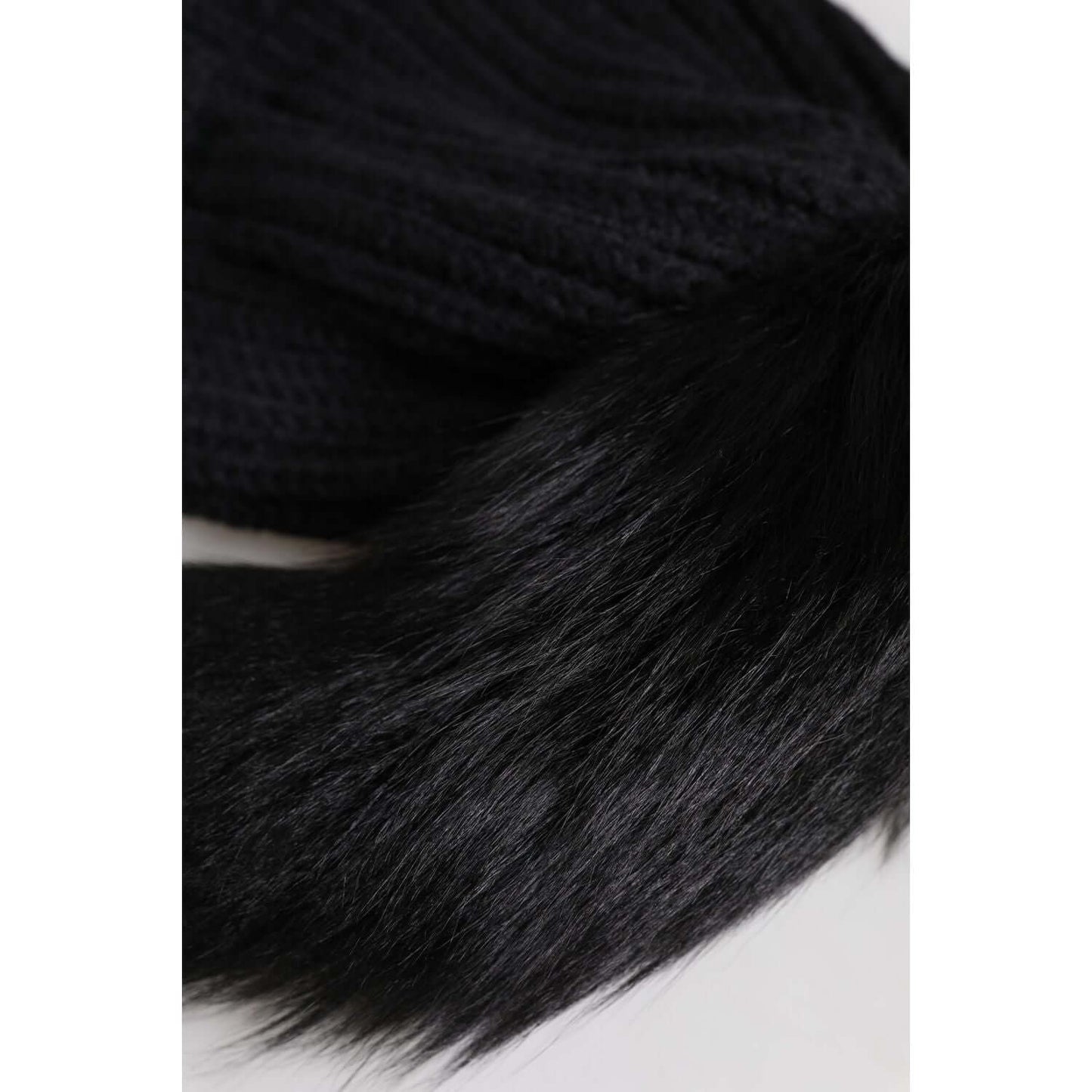 Dolce & Gabbana black knitted fur winter beanie hat made of acrylic, alpaca, and wool with logo detail.