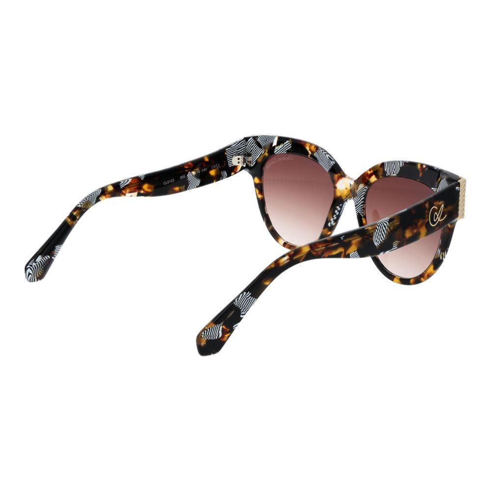 Tortoiseshell butterfly sunglasses with gradient lenses and white leaf pattern on arms.