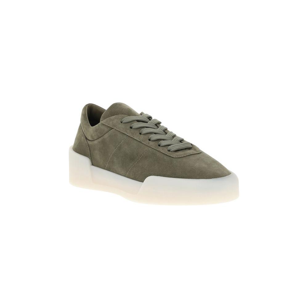 Fear Of God Aerobic Low Sneakers in suede with round toe and contrasting rubber sole, showcasing bold, minimal elegance and monogram heel patch.