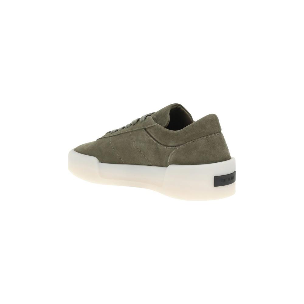 Fear of God Aerobic Low Sneakers in suede with rubber sole, featuring a round toe, lace-up closure, and monogram patch on heel.
