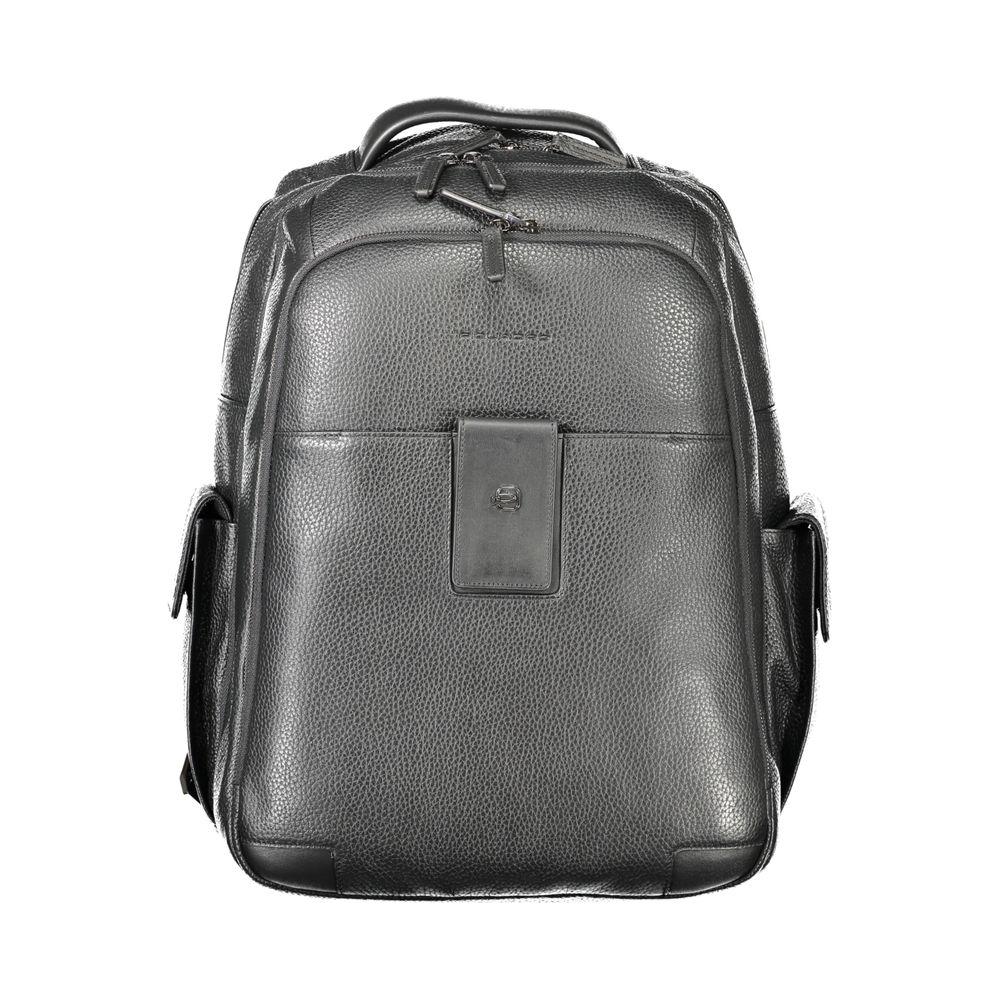 Piquadro black leather men's backpack with zip and magnet closure, padded laptop compartment, and multiple pockets for professionals.