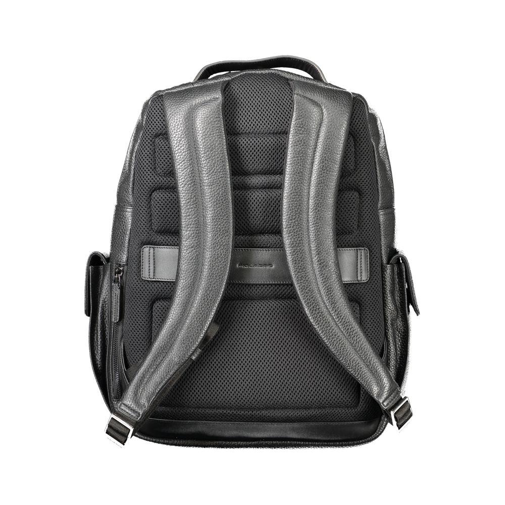 Back view of Piquadro black leather men's backpack showing padded straps and ergonomic design. Ideal for modern professionals.