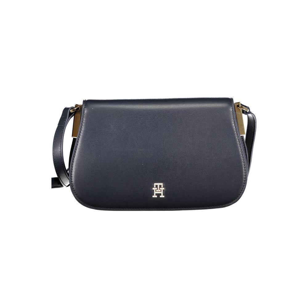 Tommy Hilfiger blue polyethylene handbag with adjustable shoulder strap, logo, and snap closure, featuring one internal pocket.