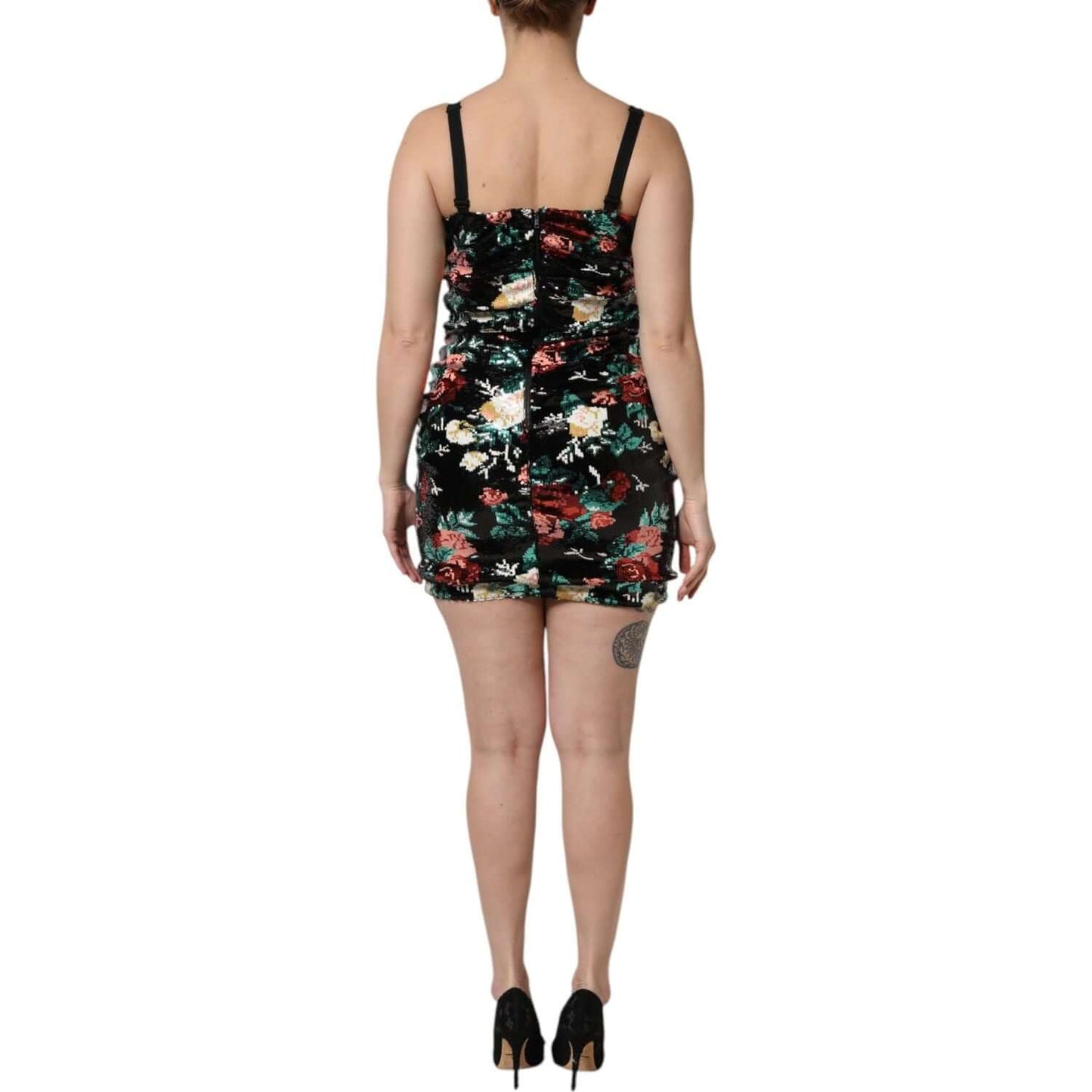 Back view of Dolce & Gabbana black floral sequin sleeveless sheath dress, showcasing intricate design and high craftsmanship.