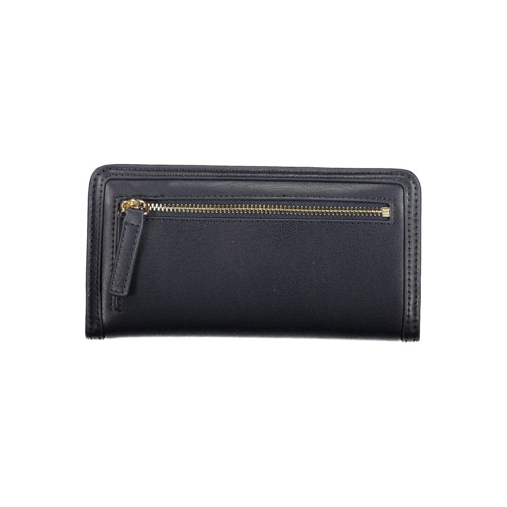 Tommy Hilfiger blue polyethylene wallet with external pocket and logo, featuring four compartments and double card spaces.