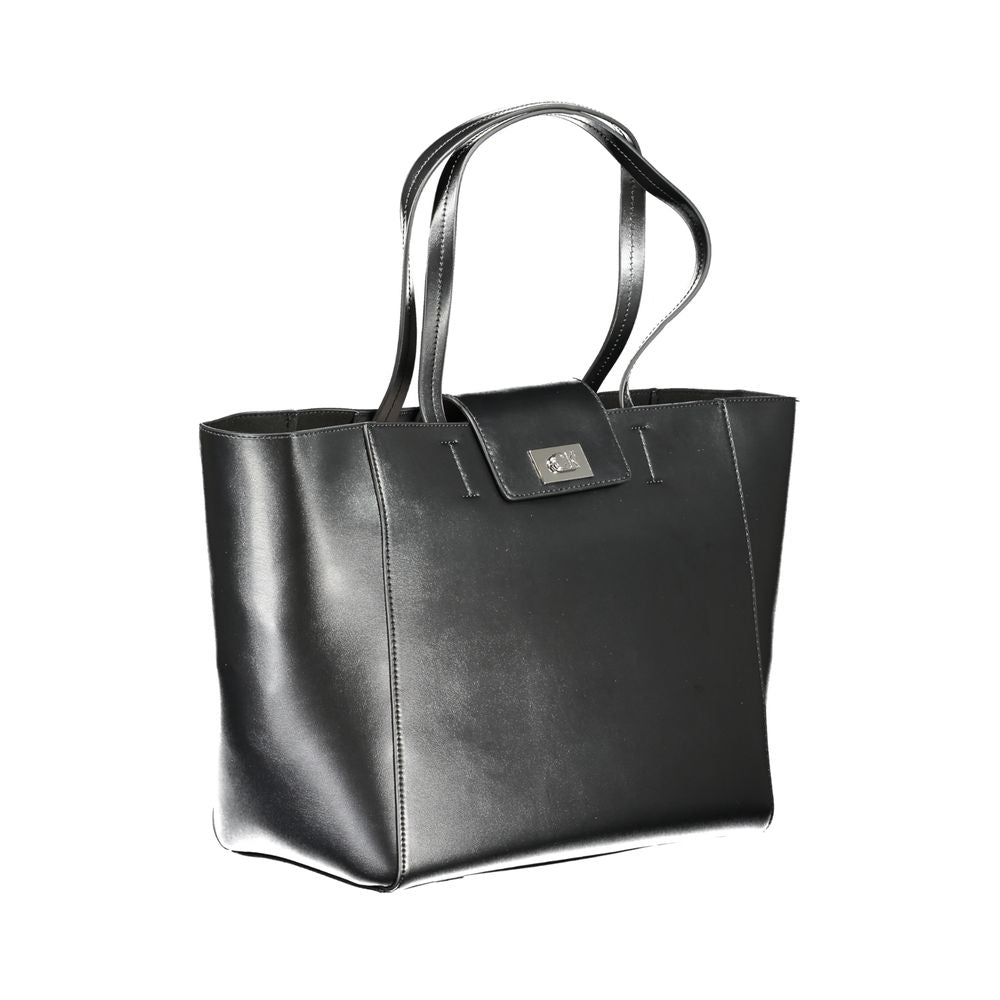 Calvin Klein Black Polyester Handbag with two shoulder handles, snap closure, internal pocket, and logo detailing.