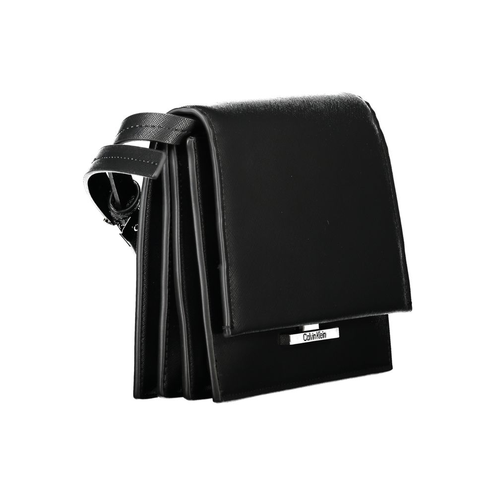Calvin Klein Black Polyethylene Handbag with adjustable strap, 3 compartments, and snap closure