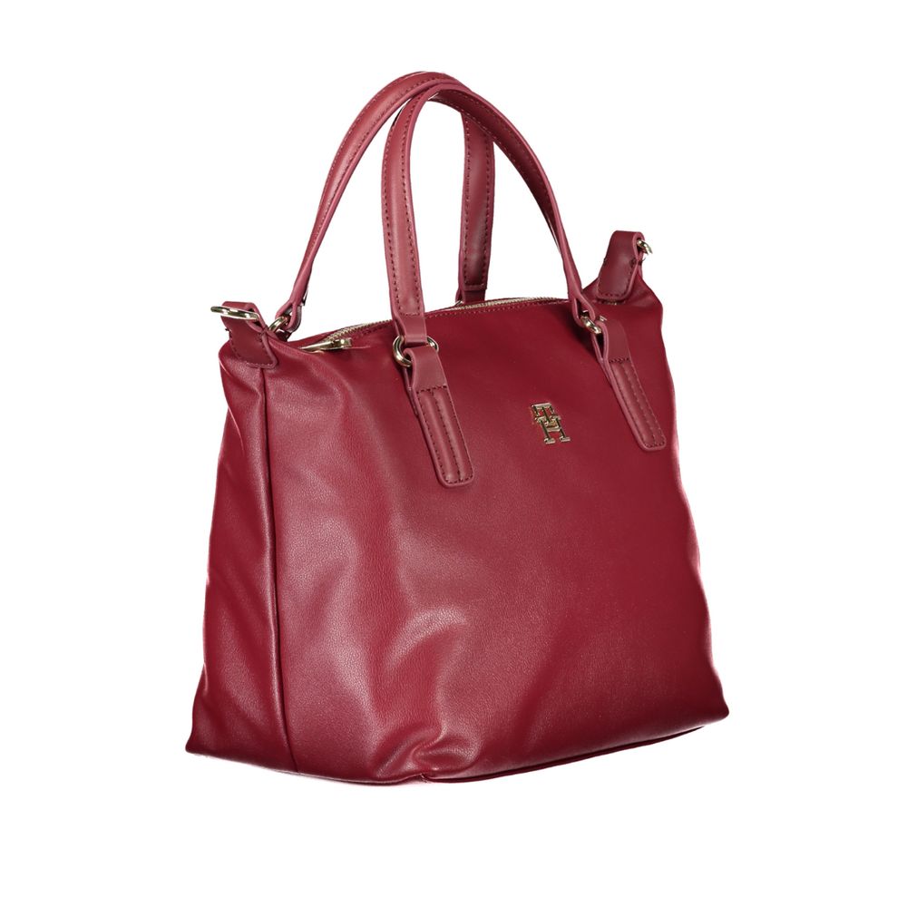 Tommy Hilfiger Red Polyester Handbag with 2 handles, adjustable strap, internal pocket, and zip closure.