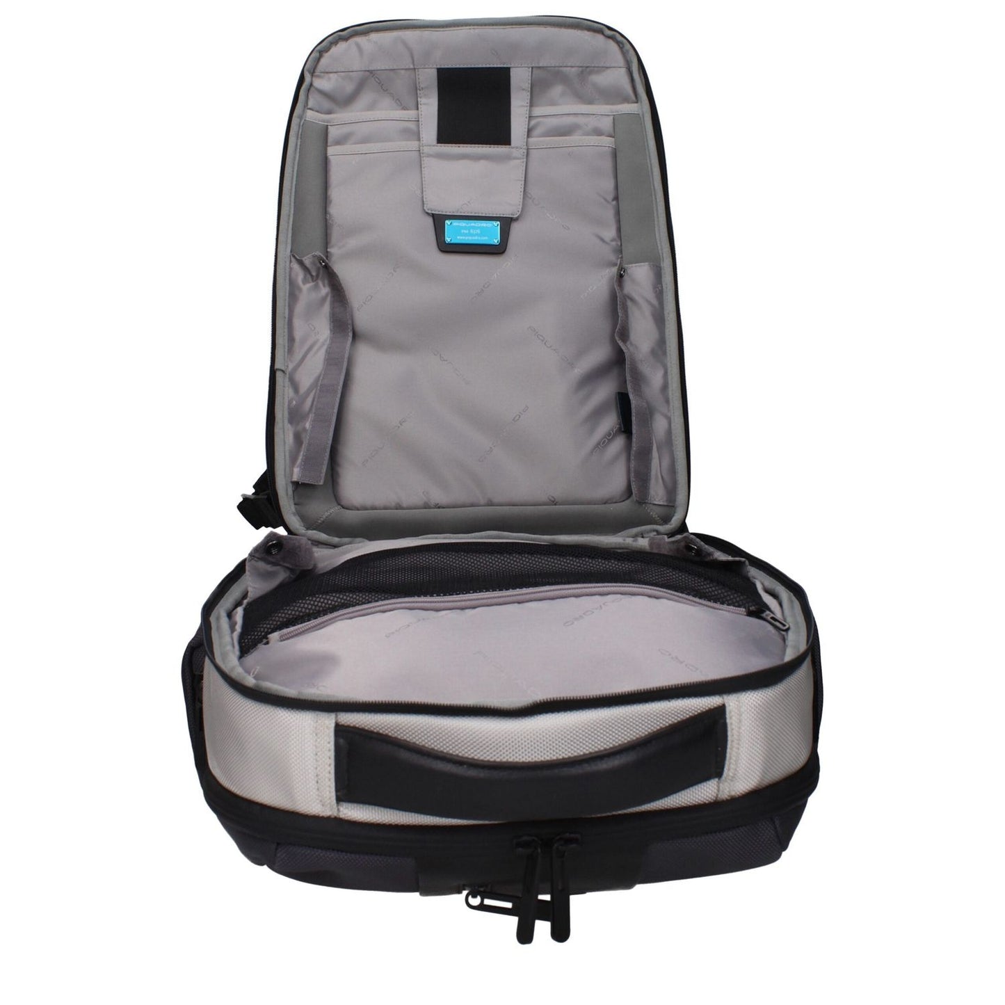 Interior view of Piquadro Gray Nylon Backpack with compartments for iPad and PC, featuring RFID and water-resistant material.