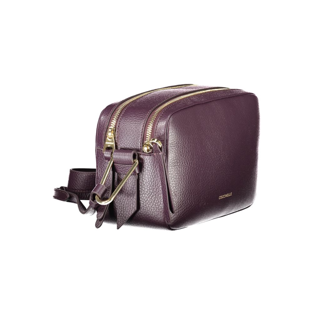 Coccinelle Purple Leather Women Handbag with adjustable strap, dual compartments, and zip closure in luxurious Italian style.