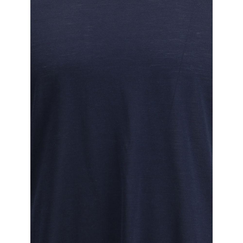 Brunello Cucinelli Silk T-ShirtBrunello Cucinelli’s signature silk T-Shirt expresses a refined, contemporary style. The essential crew neck and monochrome pattern enhance the lightness and natural sheen of the fabric, while the small side slits add moveme