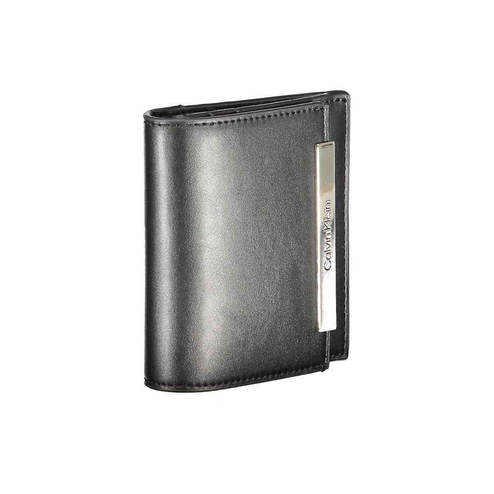 Calvin Klein Black Polyester Wallet with RFID block, external pocket, card slots, logo, zip and automatic closure.