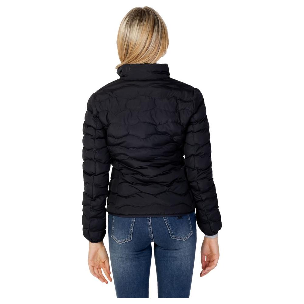 Back view of EA7 Emporio Armani women's black polyester down jacket showcasing quilted design and modern fit.