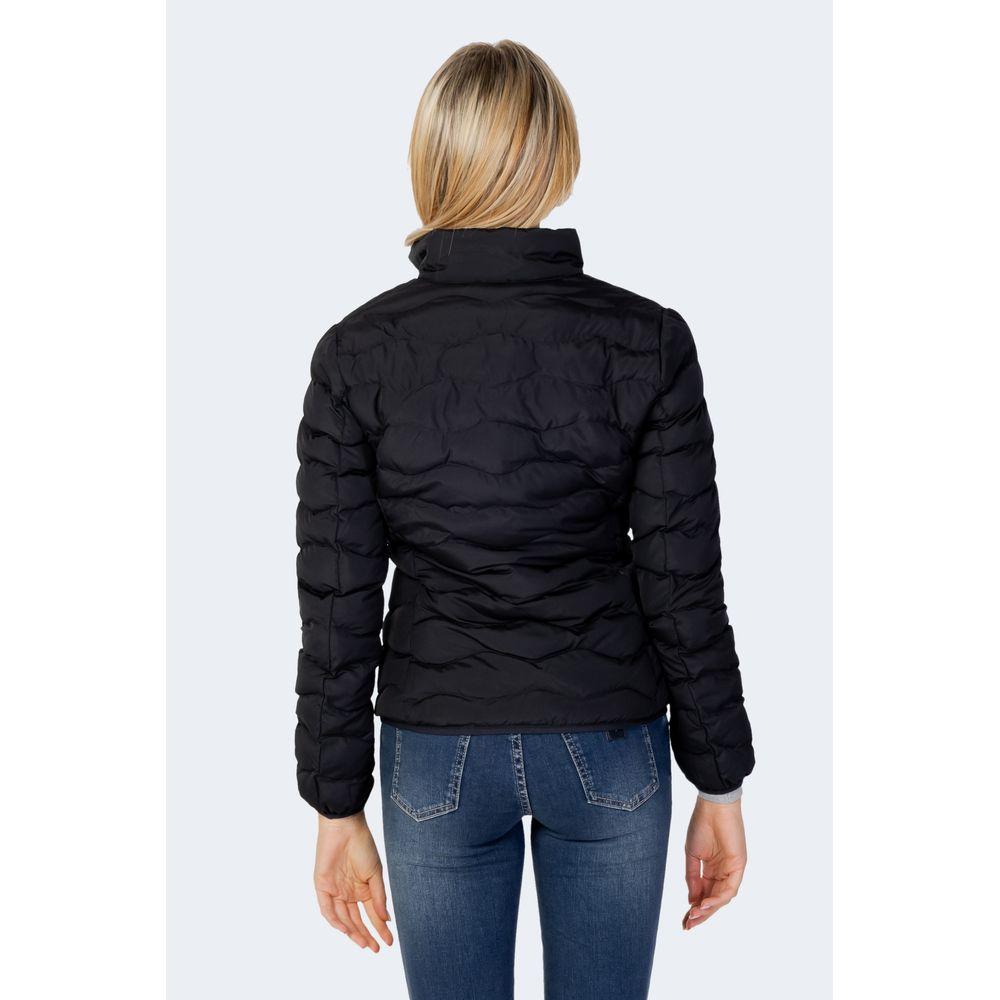 Back view of woman wearing EA7 Emporio Armani black polyester jacket, showcasing quilted design and slim fit.