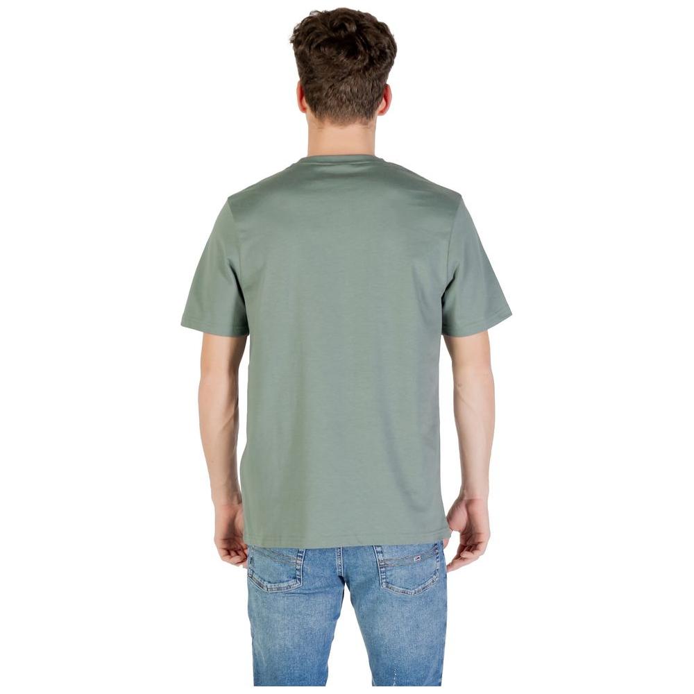 Man wearing Lyle & Scott green cotton T-shirt, back view, showcasing classic fit and simple design.