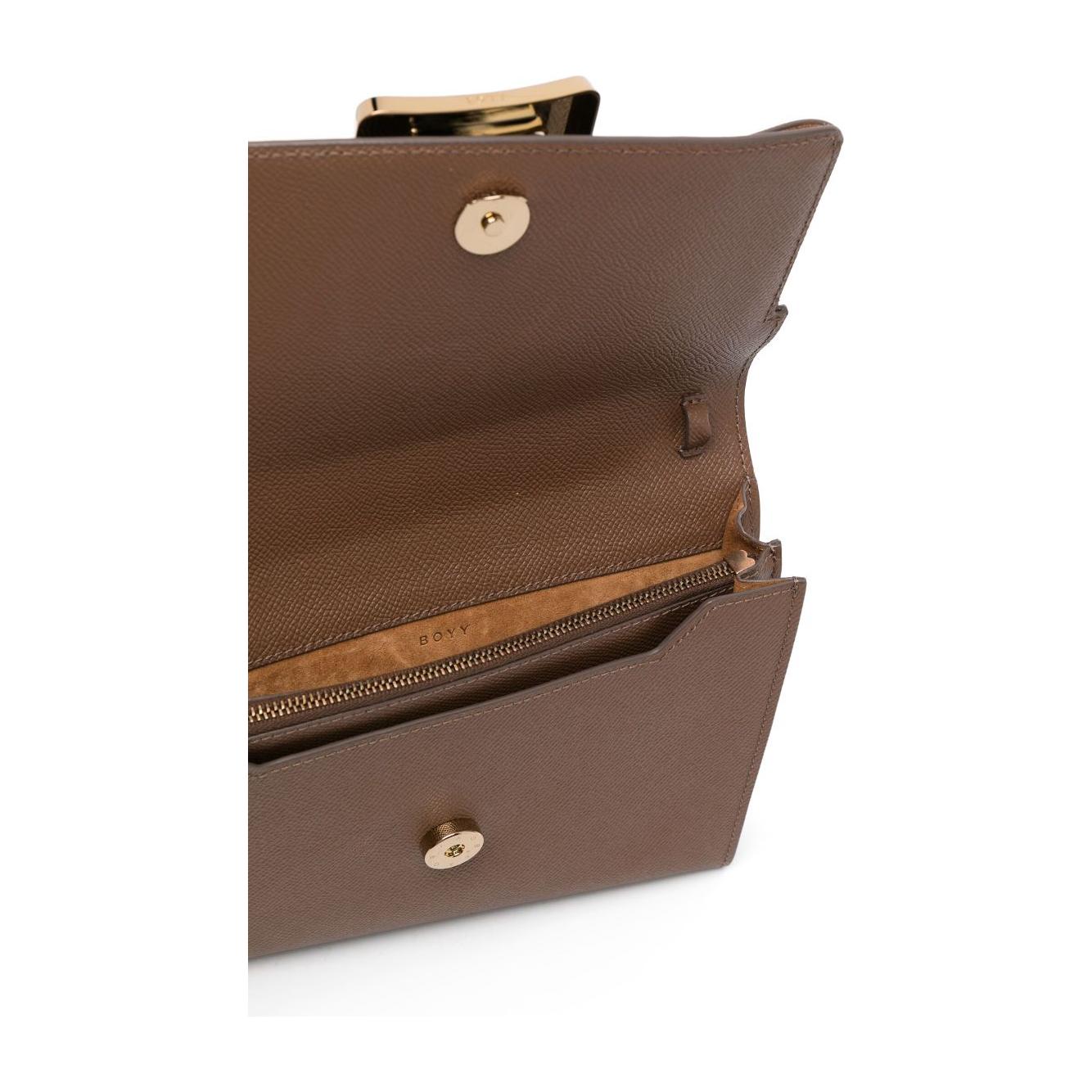 Front view with bag zipped and handles upright.