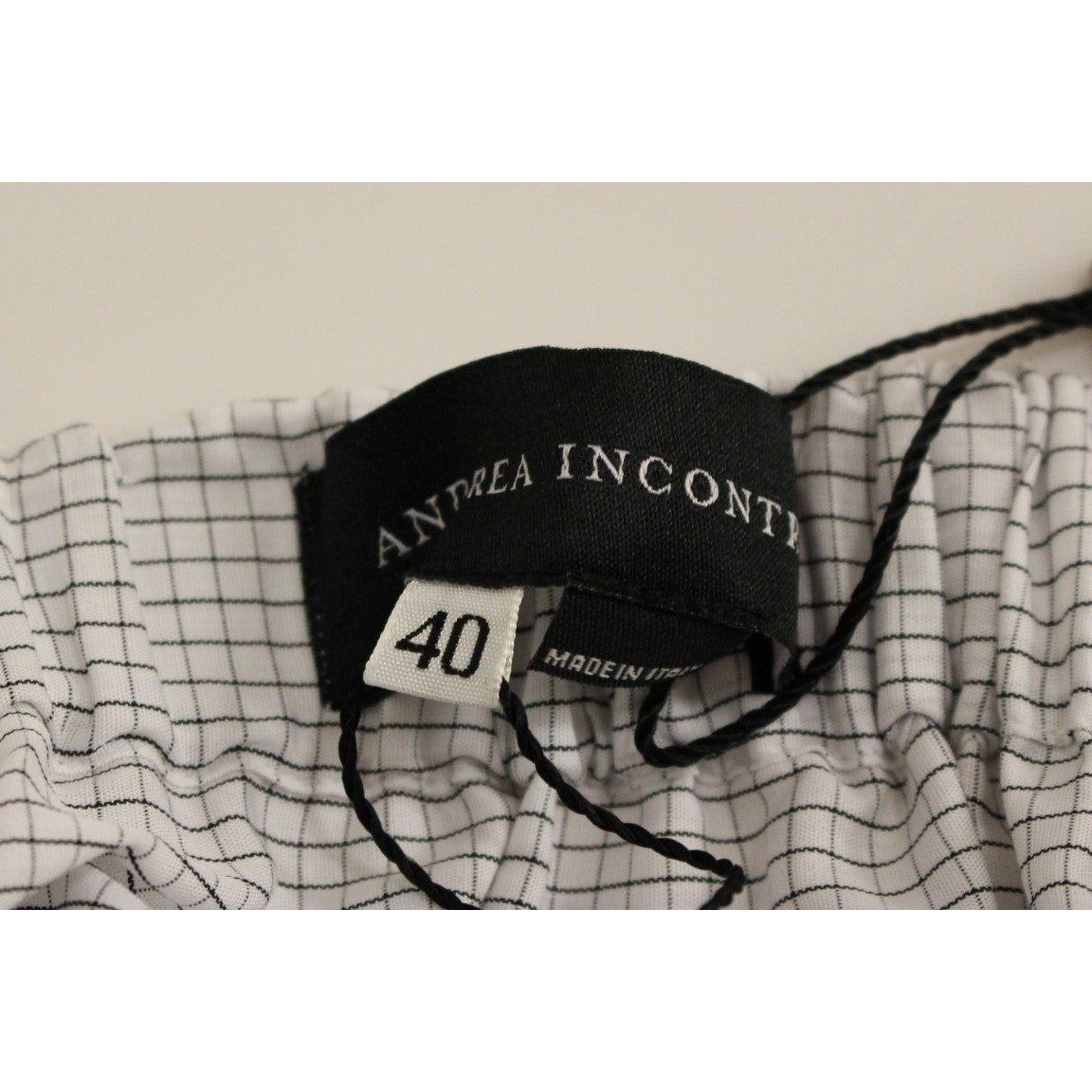 تنورة أندريا إنكونتري الصغيرة الأنيقة باللون الأبيض - أنيقة وخالدة