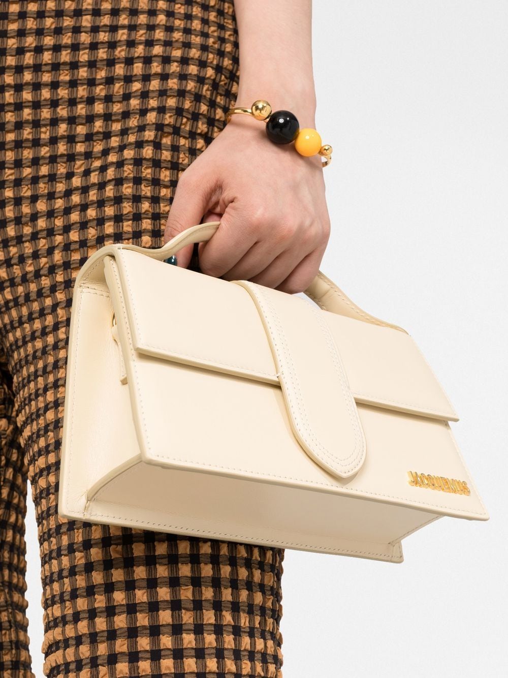 Front view with bag zipped and handles upright.