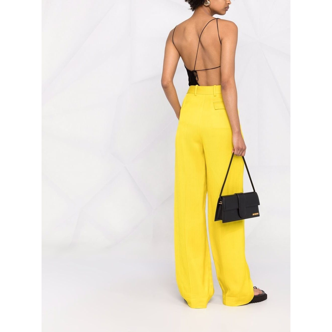 Front view with bag zipped and handles upright.