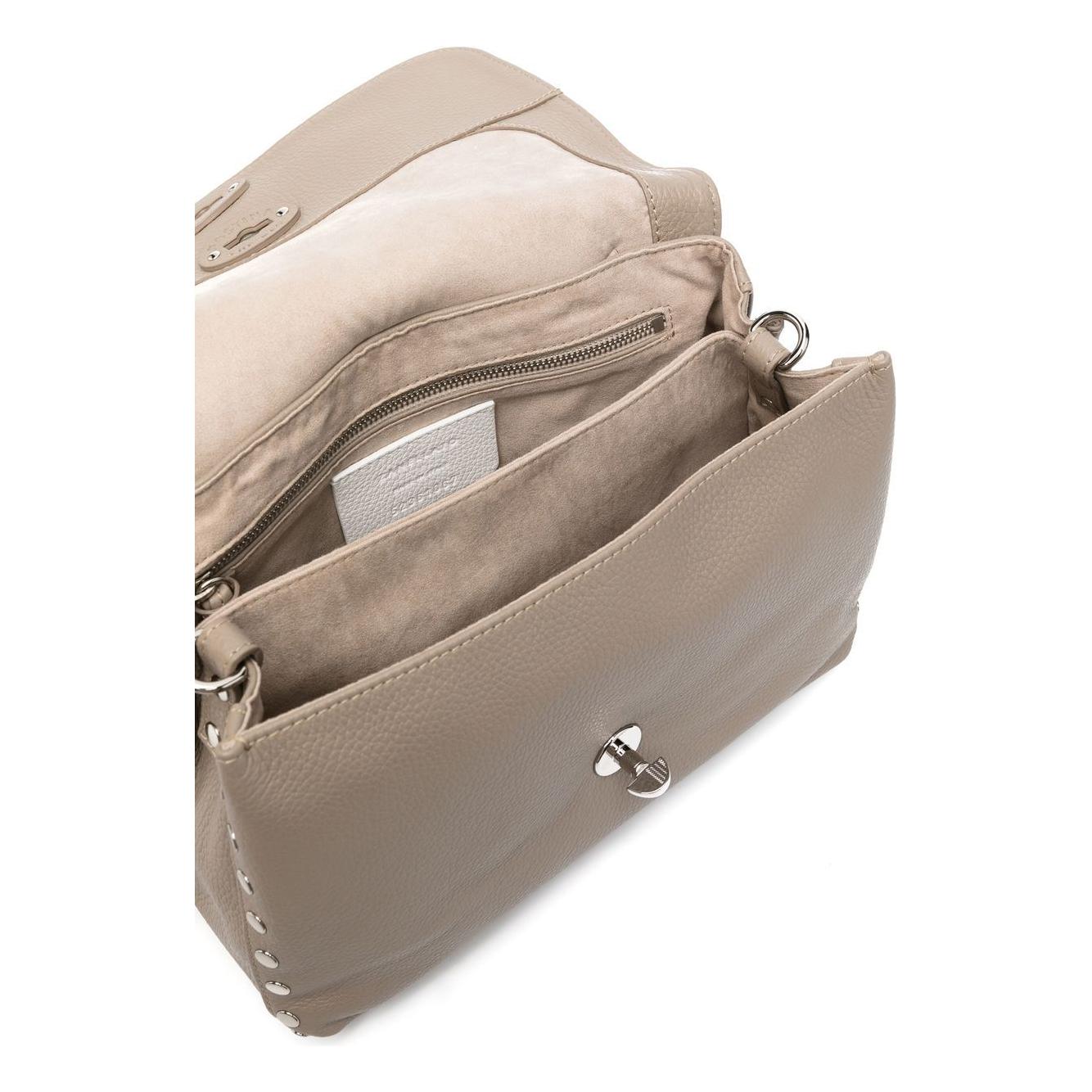 Front view with bag zipped and handles upright.