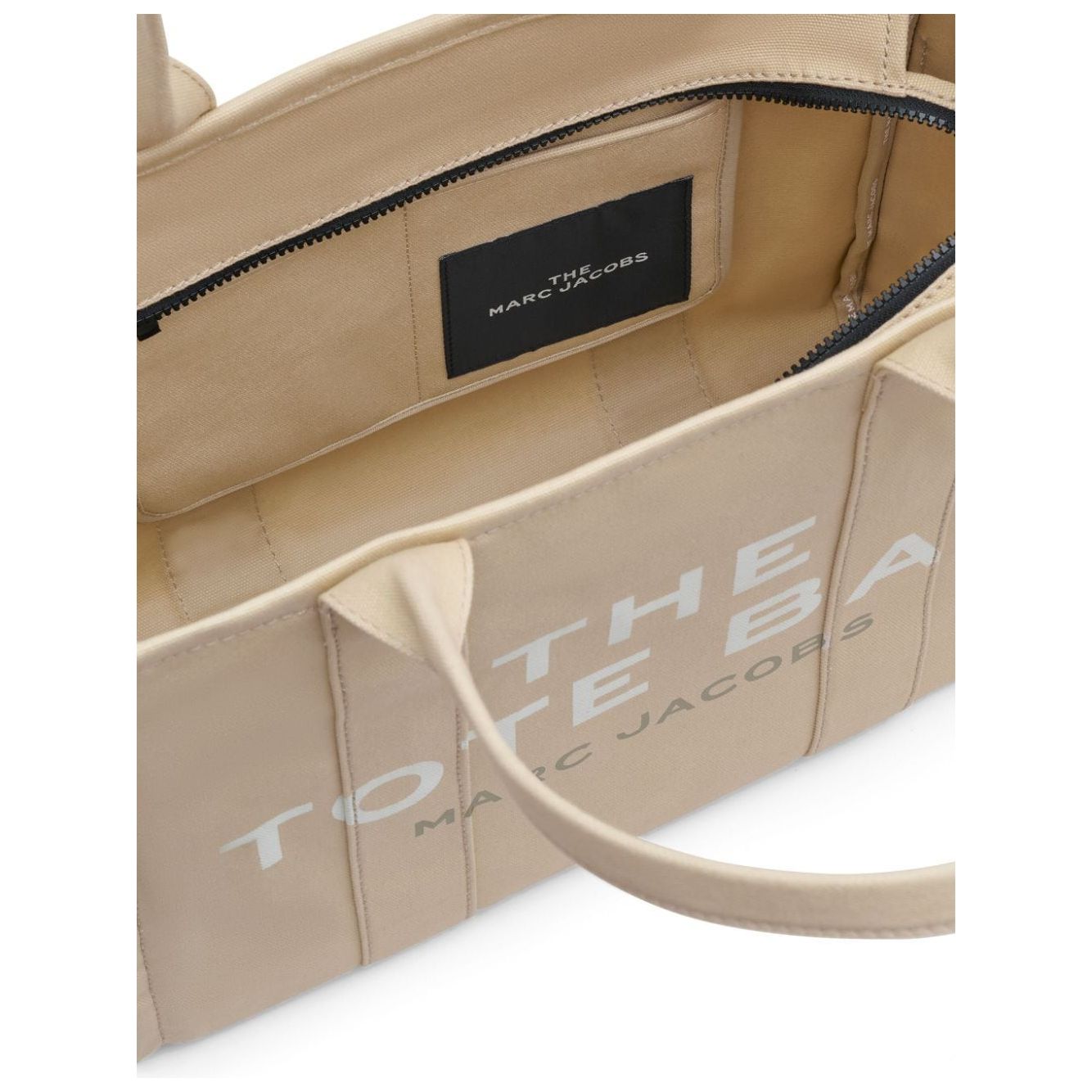 Front view with bag zipped and handles upright.
