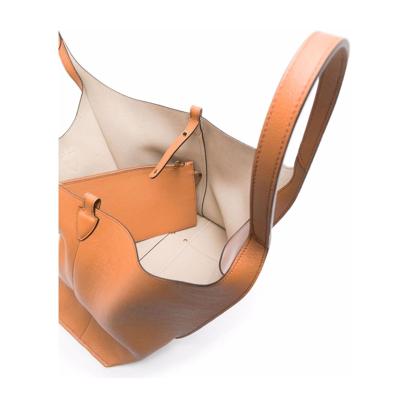 Front view with bag zipped and handles upright.
