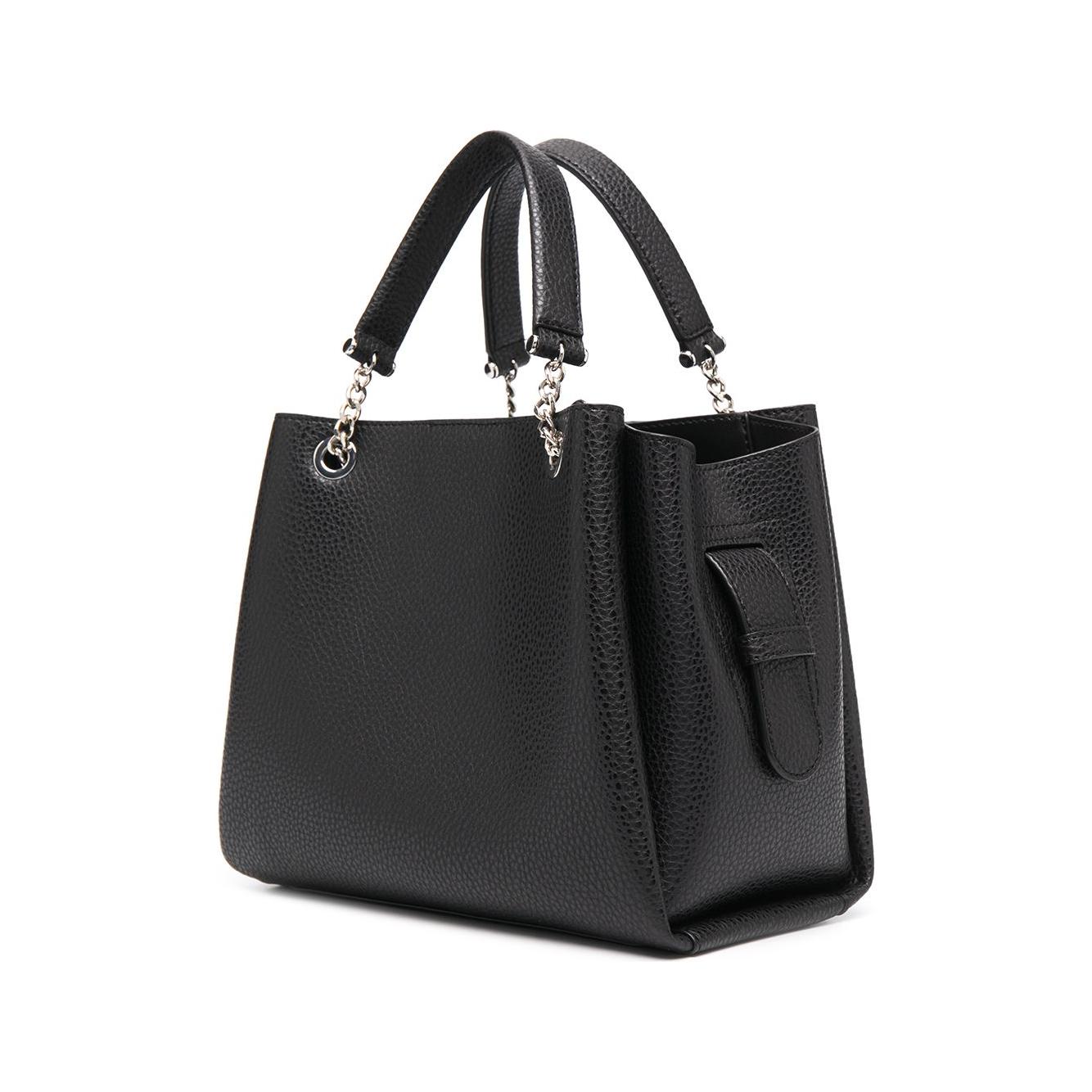 Front view with bag zipped and handles upright.