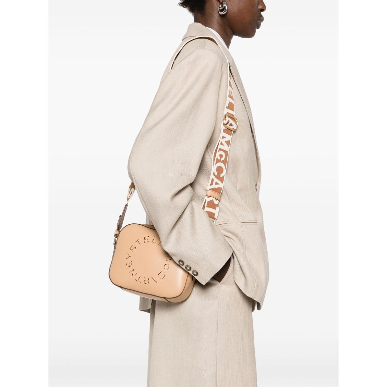 Front view with bag zipped and handles upright.