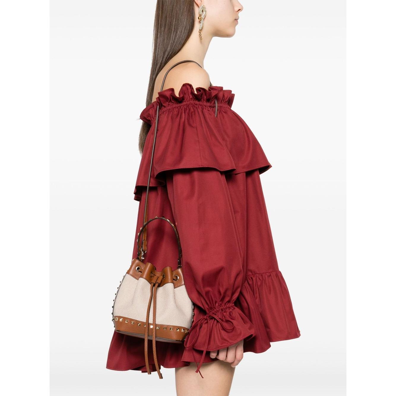 Front view with bag zipped and handles upright.