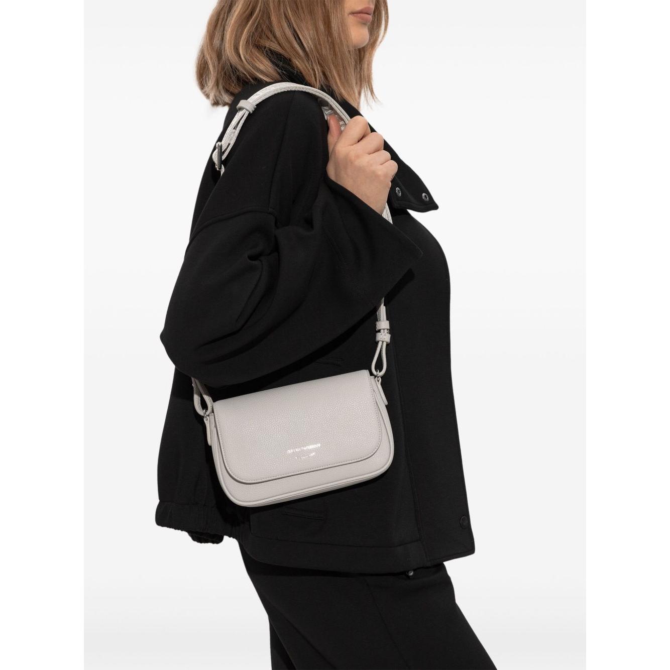 Front view with bag zipped and handles upright.