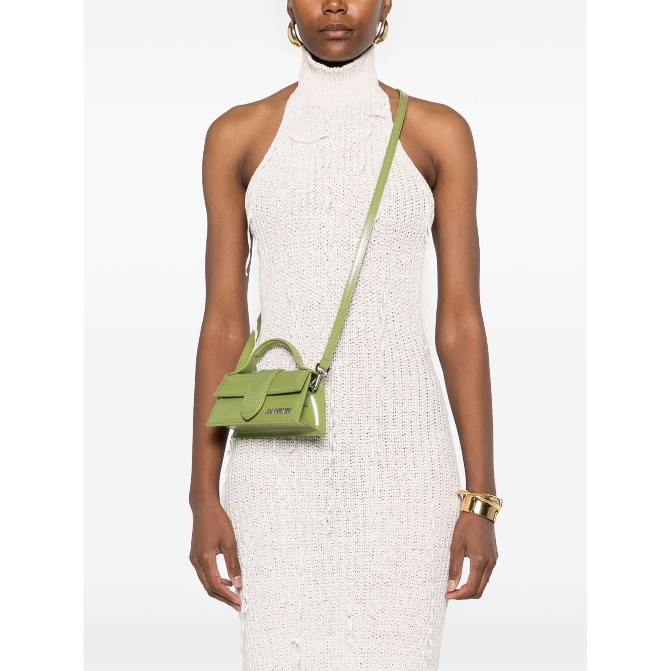 Front view with bag zipped and handles upright.