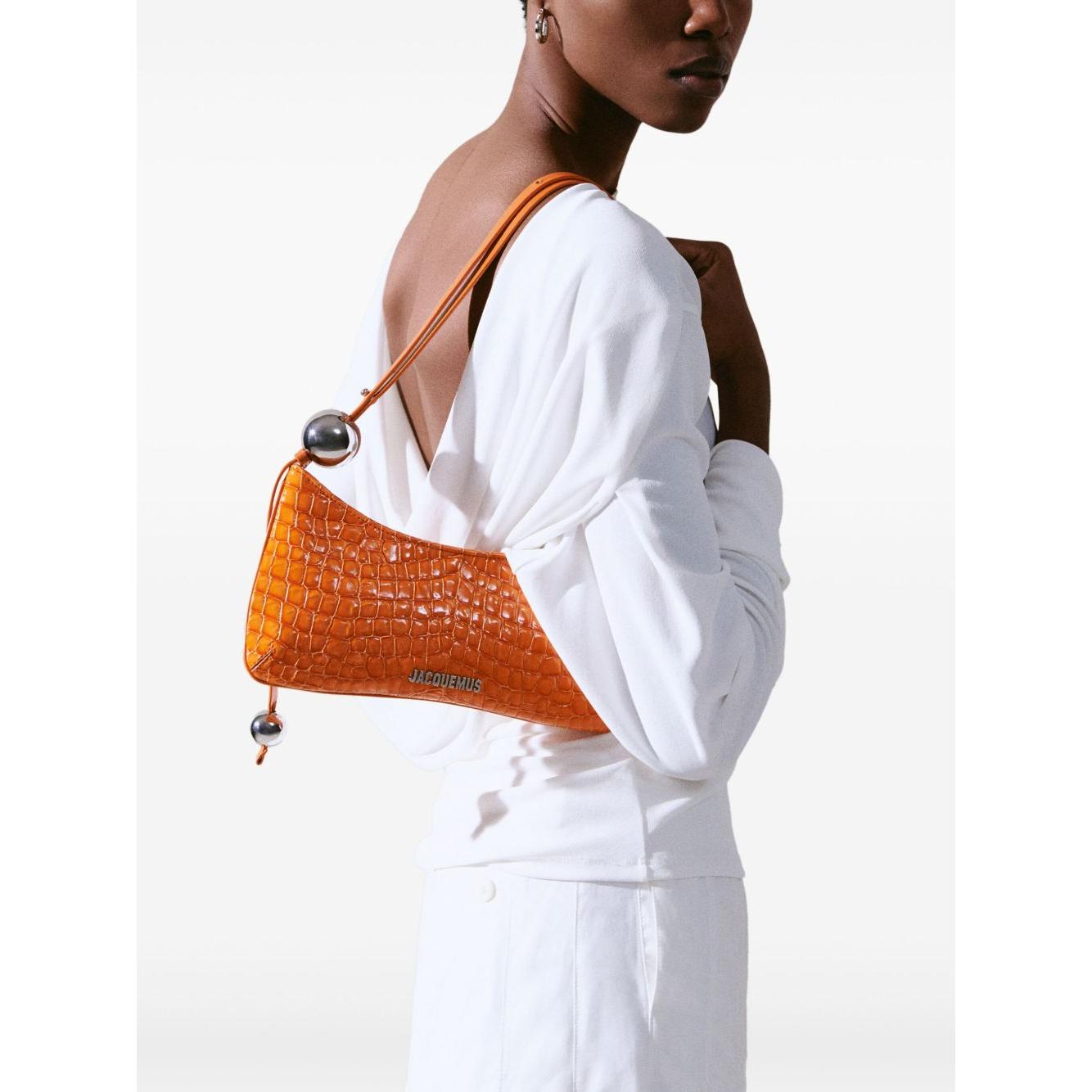 Front view with bag zipped and handles upright.