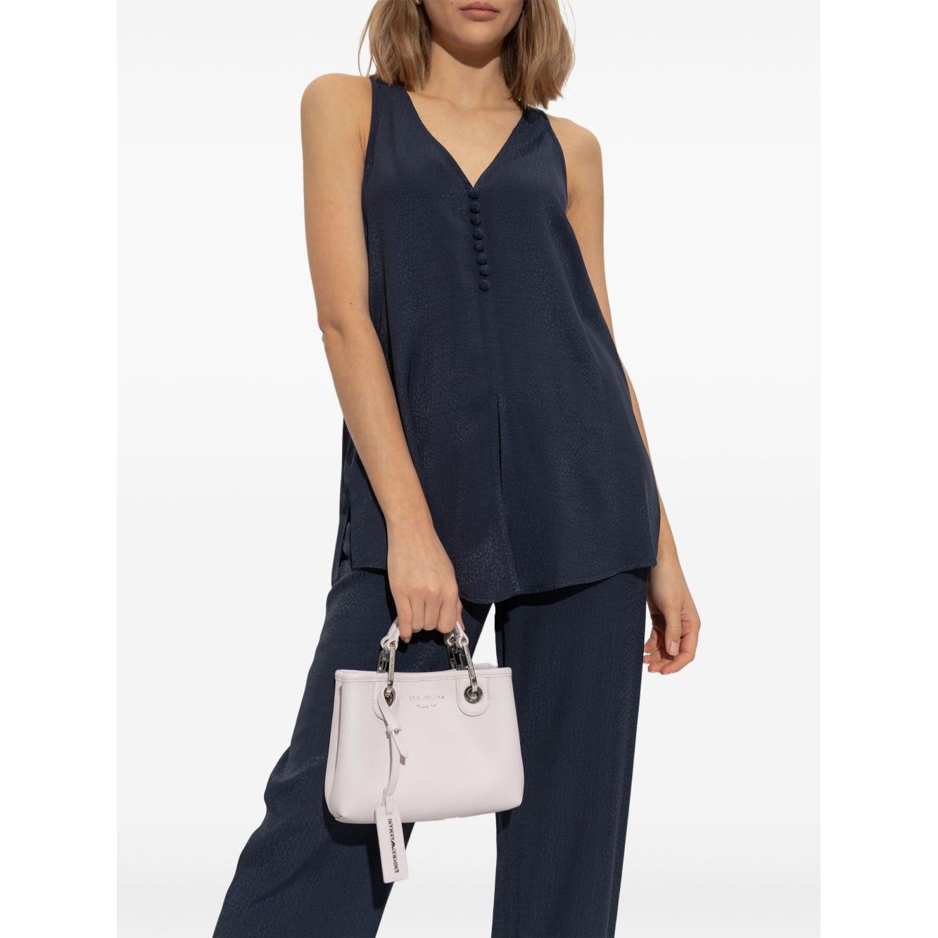 Front view with bag zipped and handles upright.