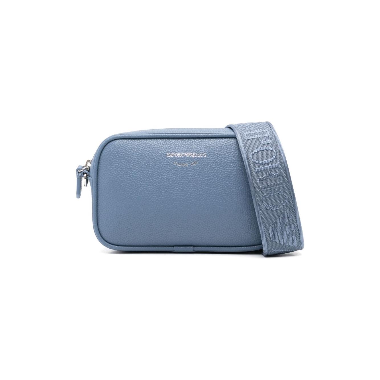 Front view with bag zipped and handles upright.