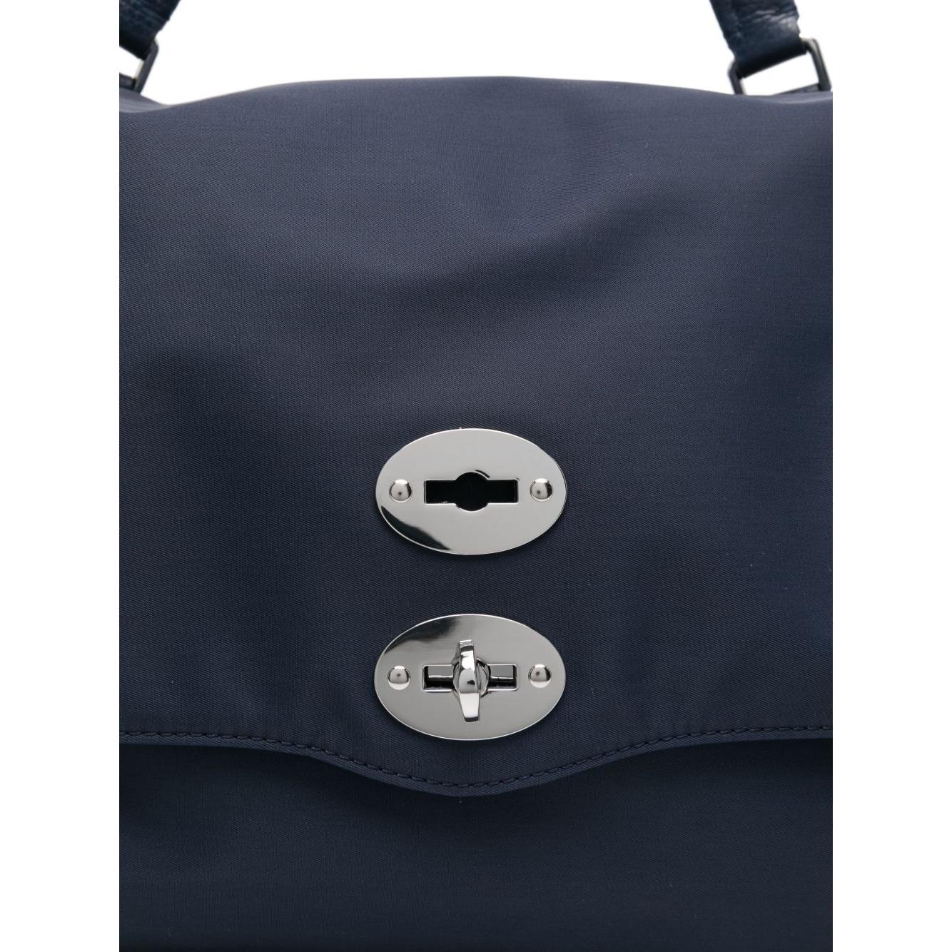 Front view with bag zipped and handles upright.