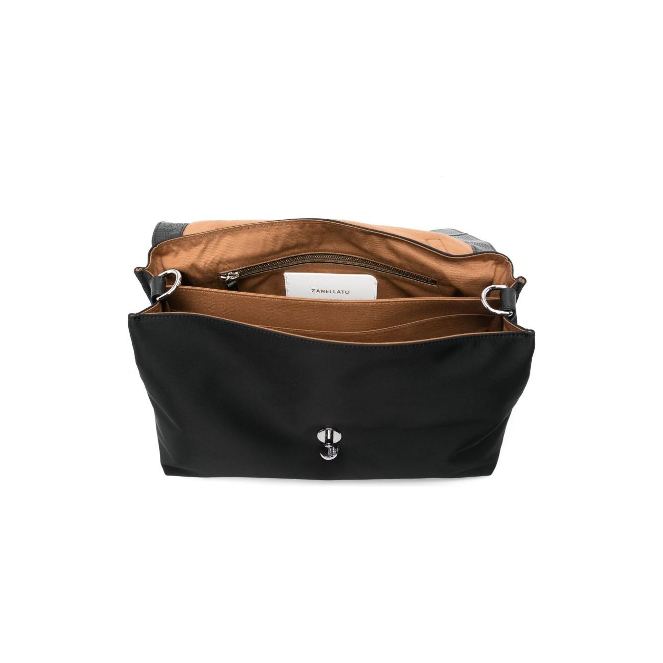 Front view with bag zipped and handles upright.