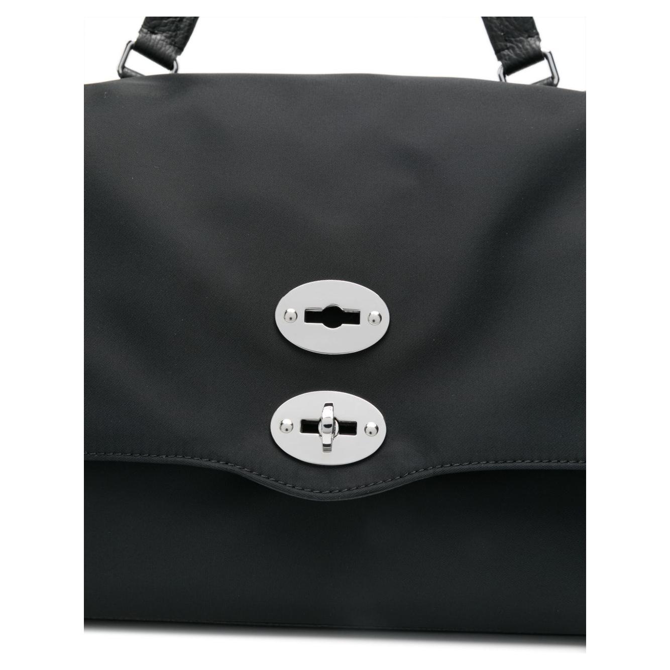 Front view with bag zipped and handles upright.