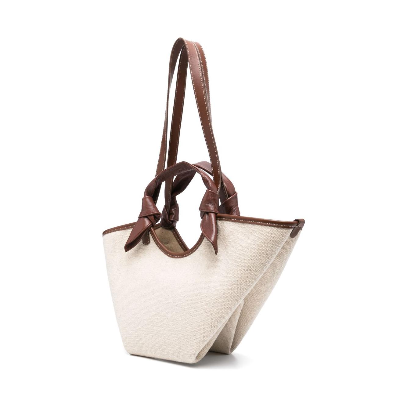 Front view with bag zipped and handles upright.