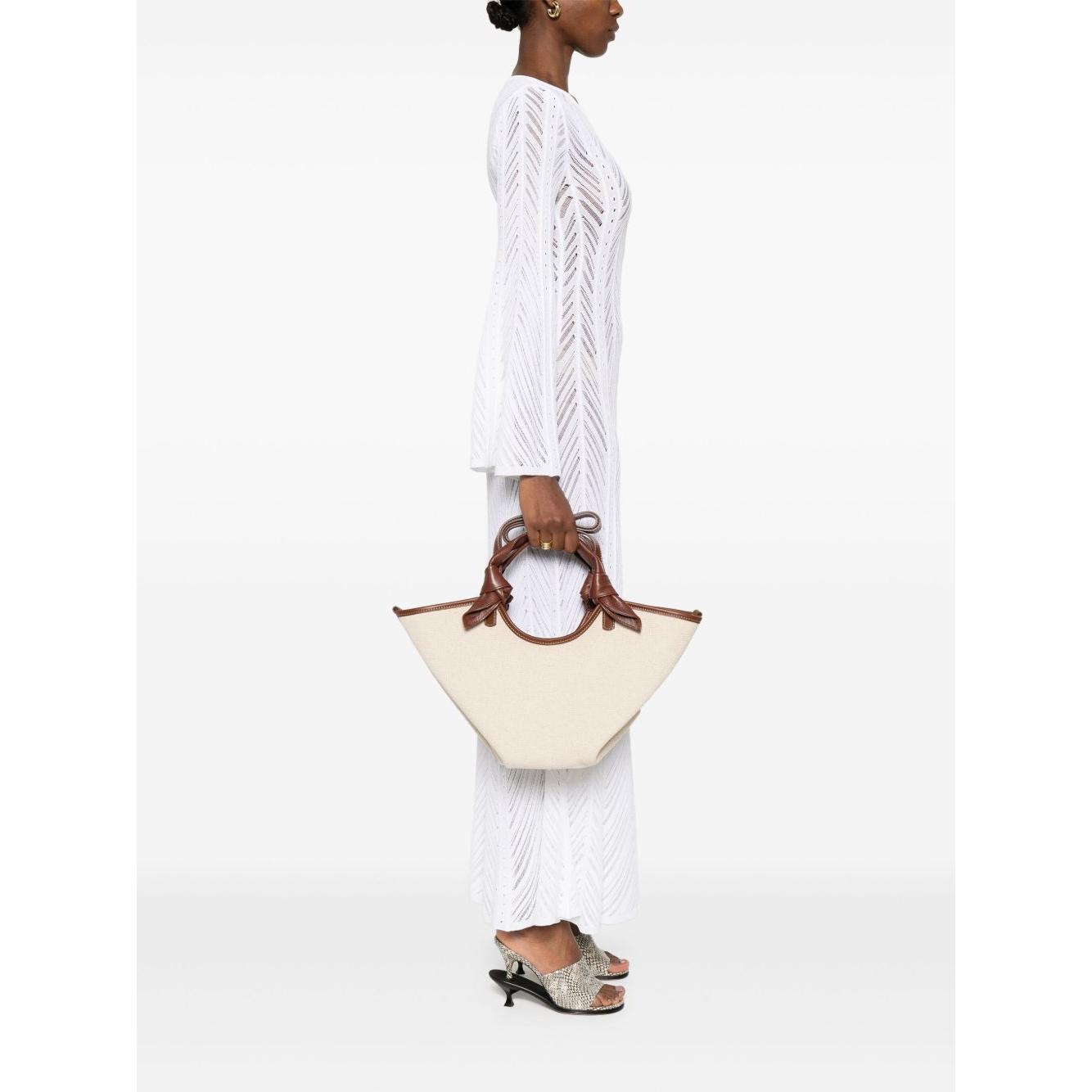 Front view with bag zipped and handles upright.