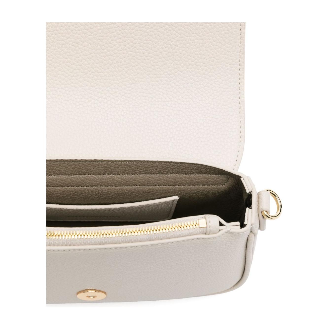 Front view with bag zipped and handles upright.