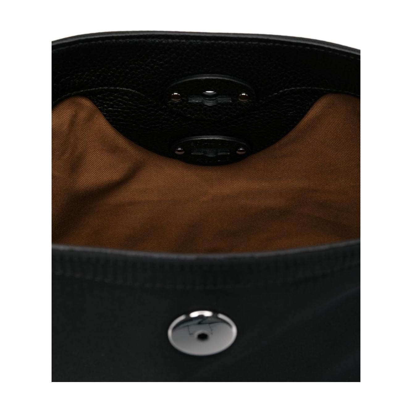 Front view with bag zipped and handles upright.
